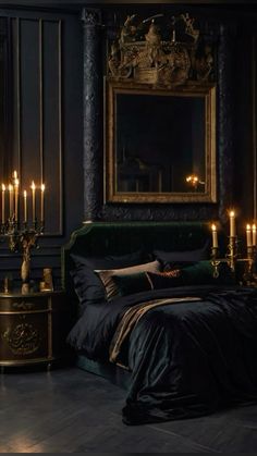 a bedroom with black walls and gold trimmings is lit up by candles in the dark