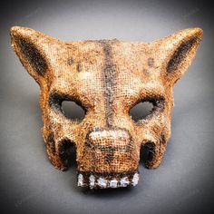 Unleash The Beast Within With The Angry Mummy Wolf Halloween Masquerade Mask. Perfect For Halloween, Masquerade Parties, Or Themed Events, This Mask Features A Fierce And Snarling Wolf Wrapped In Tattered Mummy Bandages. The Detailed Design And Realistic Texture Make This Mask A Standout Accessory, Ensuring You Make A Memorable Entrance. Crafted From High-Quality Materials, It Provides A Comfortable Fit For Extended Wear, Allowing You To Stay In Character All Night Long. Made From Durable Gauze Post-apocalyptic Halloween Masks And Prosthetics, Post-apocalyptic Masks And Prosthetics For Halloween, Post-apocalyptic Halloween Masks For Costume Party, Post-apocalyptic Black Costume Mask, Post-apocalyptic Masks For Halloween Costume Party, Themed Masquerade Mask For Halloween Cosplay, Brown Costume For Halloween Fantasy Events, Brown Halloween Costume For Fantasy Events, Post-apocalyptic Halloween Cosplay Masks