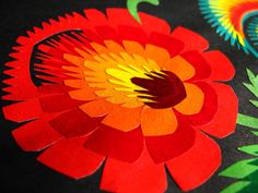 an image of paper flowers on the table