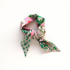 "This pink and green reversible triangular bandana is composed by Cinne in a patchwork of original prints. Throw it on for an effortlessly chic statement, giving any casual look a stylish twist. Style it around your neck, in your hair, or tied on your favorite bag.  They are constructed entirely by hand with love and attention to every detail. Find styling examples in the last photo. Ready to ship, ready to gift. color mix I've got all the best pinks and greens covered in this patchwork print wi Trendy Gift Bandana One Size, Spring Adjustable Pink Bandana, Summer Silk Scarf With Ties, Trendy Bandana For Summer Gift, Trendy Summer Bandana As Gift, Pink Bohemian Bandana For Summer, Trendy Summer Bandana Gift, Trendy Green Silk Scarf For Spring, Trendy Green Scarves As Gift