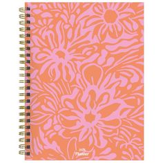 an orange and pink notebook with flowers on it