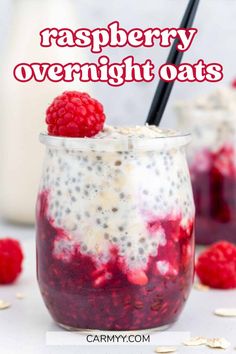 raspberry overnight oats in a glass with berries on top and the text overlay