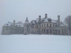 a large building that is covered in snow