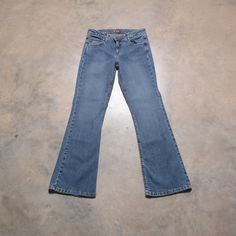 You are looking at a classic pair of vintage 90s/00s LEI bootcut flare jeans. Excellent vintage condition. Labeled as a size 9. Please see actual measurements below.  Waist: 30" Rise: 9" Hips: 35" Bottom opening: 19" Inseam: 31" Outseam: 39.5" If you would like to see additional photos or have any other questions, please do not hesitate to ask, and thanks for looking! Shipping disclaimer: All domestic orders under 16oz ship USPS Ground Advantage. All domestic orders over 16oz ship USPS priority Hip Hugger Jeans, 2000 Women, 90s 00s, Dream Clothes, Stretch Jeans, Flare Jeans, Lei, Hippie Boho, Vintage 90s