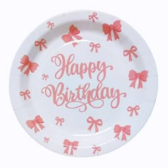 a paper plate with pink bows and the words happy birthday written on it in white