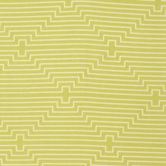 a yellow and white rug with lines on it