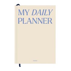 a book with the title'my daily planner'in blue on top of it