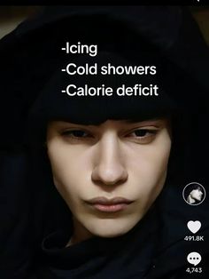 a man wearing a black hoodie with the caption icing cold showers - calorie deficit