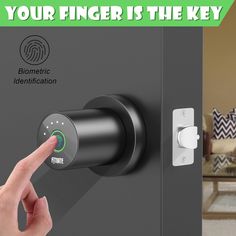 a finger is pressing the button on an electronic door lock