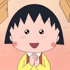 a cartoon girl with black hair wearing a yellow shirt and red suspenders is smiling at the camera