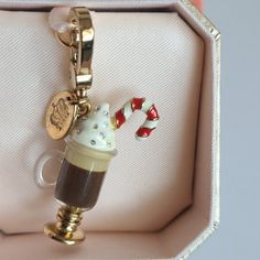 New In Box Juicy Couture Hot Chocolate Charm. Juicy Charms, Trinket Shelf, Juice Couture, Juicy Couture Earrings, Ur Mum, Madonna Photos, Juicy Couture Necklace, Juicy Couture Bracelet, Cupcake Charms