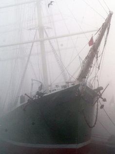 a large boat sitting on top of a body of water