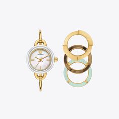 A delicate bangle watch with three interchangeable top rings: solid gold-tone stainless steel, horn, and light blue with gold-tone stainless steel detailing. Whether styling the mother of pearl face with the base two-tone stainless steel dial or one of the decorative top rings, this Miller set is the perfect way to add versatility to your everyday accessories. Expensive Gifts For Him, Steel Detailing, Womens Designer Watches, Senior Night Gifts, Front Back Earrings, Bangle Watches, Watch Gift, Designer Watches, Top Rings