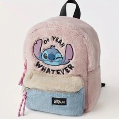 Brand New Zara Plush Disney Stitch Bag Disney Lilo & Stitch Ultra Soft Plush Colorblock Mini Backpack Adorable And Ultra Fluffy 11" Lilo & Stitch, Mini Backpack By Zara! This Conversational Bag Has A Winking Stitch Illustration On The Front, With "Oh, Yeah Whatever" In Text. Cotton Faux Fur Plush Lines The Entire Exterior Of The Bag In A Colorblock Pattern Of Pink, White & Blue Tones. Pink Ties Hang From Each Of The Two Zippers - Top Zipper Access And Front Pocket Zipper. Stitch Logo Sewn Into T Stitch Plush, Stitch Backpack, Kindergarten Backpack, Cartoon Backpack, Lilo Y Stitch, Kids School Backpack, Lilo Et Stitch, Mini Mochila, Mickey Mouse Cartoon