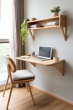 a laptop computer sitting on top of a wooden desk next to a chair and window