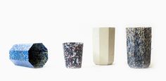 four different types of vases sitting next to each other