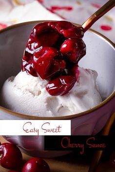 a bowl filled with ice cream and cherries