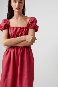 "HOLIDAY is an elegant puff short sleeve linen midi dress.  DETAILS - Puff short sleeve - Elasticated body - Midi length - Oeko-Tex certified 100% local washed midweight linen - Cut and sewn to order just for you in our studio COLOR - Raspberry, you can also choose other colors above - Fabric samples are available here https://www.etsy.com/listing/586569696/linen-fabric-samples SIZING & FIT - Fit true to size - Model is 5'9.5\" / 177cm and wearing a size XS CARE FOR LINEN - Machine wash up to 30ºC/86ºF gentle cycle - Lay flat to dry or tumble dry low - Warm iron if needed - Do not bleach SIZE GUIDE Size conversion guide Size XS (US 0-2, IT 36-38, UK 4-6, Japan 3-5, France 32-34) Size S (US 4-6, IT 40-42, UK 8-10, Japan 7-9, France 36-38) Size M (US 8-10, IT 44-46, UK 12-14, Japan 11-13, Fr Kimono Wrap Dress, Wrap Dress Midi, Linen Wrap Dress, Linen Midi Dress, Summer Linen, Long Midi Dress, Flattering Dresses, Long Summer Dresses, Bridesmaid Robes