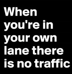 a black and white poster with the words when you're in your own lane there is no traffic