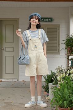 Mama bunny takes baby bunny on a walk through town. Features a high waist boyfriend fit with roomy legs, side pockets, back pockets and embroidered bib. Adjustable button straps. S: 32" waist, 40" hips, 12" rise, 25" thighs, 6" inseamM: 33.5" waist, 41.5" hips, 12" rise, 26" thighs, 6" inseamL: 35" waist, 43" hips, 12" rise, 27" thighs, 6" inseam Casual High-waisted Shortalls With Pockets, Casual White Relaxed Fit Overalls, Cute White Bottoms With Pockets, Casual White Cotton Shortalls, Cute White Overalls For Spring, Spring Cotton Utility Shortalls, Utility Cotton Shortalls For Spring, Spring Utility Cotton Shortalls, Spring Cotton Utility Overalls