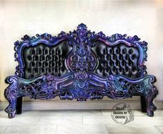 an ornate purple bench sitting on top of a tile floor in front of a wall