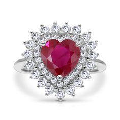 CREATED RUBY HEART RING – A captivating silver ring plated in rhodium, featuring a vibrant red heart-shaped created ruby as its focal point. REGAL DESIGN WITH CREATED WHITE SAPPHIRES – The heart-shaped created ruby is surrounded by a regal array of created white sapphires, enhancing the ring's overall allure with undeniable elegance. RHODIUM PLATING – The rhodium plating adds a lustrous finish, elevating the ring's aesthetic appeal and providing lasting durability. AFFORDABLE BRILLIANCE – Crafte Ruby Heart Ring, Ruby Heart, Ring Plate, Regal Design, Danbury Mint, White Sapphire, Red Heart, Vibrant Red, Rhodium Plated