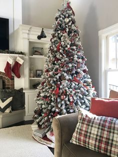 a decorated christmas tree in a living room