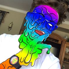 a man with his face painted like a rainbow colored jellybear and wearing a watch