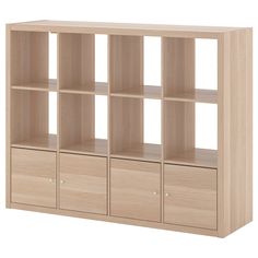 a wooden bookcase with six drawers and four doors