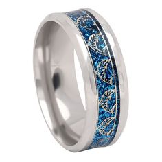 a wedding ring with blue glitter inlaying the center and an intricate design on it