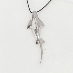 Shark Masculine Men's Pendant, Sculpture Solid Sterling Silver Unisex Pendant A statement men's handcrafted talisman, with beautiful organic form. Sharks are the object for mythological figures and awesome tales since they are steeped in mystery. While they are particularly common features of Hawaiian folklore, we find them in the mythology of the Australian Aboriginal people, Indonesian tribes and the Indians of North America. There are even some accounts of sharks in Greek mythology as Poseido Gift For Guys, Shark Pendant, Silver Shark, Shark Necklace, Handmade Sculpture, Aboriginal People, Surfer Necklace, Silver Surfer, Unisex Gift