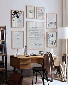 a home office with art on the wall