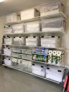 the shelves are filled with plastic containers and other items to keep things organized on them