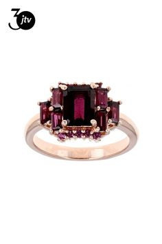 1.19ct emerald cut, 1.12ctw baguette, and .26ctw round Raspberry rhodolite 18k rose gold over sterling silver ring. Measures approximately .63"L x .44"W. Ring shank measures .06"W. Not sizeable. Ring Shank, 18k Rose Gold, Emerald Cut, Sterling Silver Ring, Silver Ring, Sterling Silver Rings, Raspberry, Jewelry Box, 18k Gold