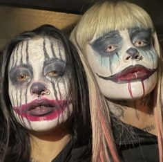 two women with makeup on their faces and one has long hair, the other is blonde