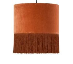 an orange lamp with fringes hanging from the ceiling