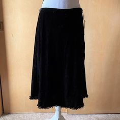 Nwt Sz 8 Skirt Made By Aks Amy K Su. It Is A Light Weight Crushed Velvet In Black With A Black Lace Trim Around The Bottom Hem. This Skirt Is Unlined And Has A Side Zipper Closure. Measurements Are 32 Inches Around The Waist, 42 Inches Around The Hips, And 27 Inches Long. Maxi Skirt Whimsigoth, Whimsy Goth Skirt, Romantic Goth Skirt, Gothic Black Asymmetrical Skirt, Black Maxi Skirt Gothic, Long Wool Skirt, Black Silk Skirt, Midi Skirt Casual, Black Hippy