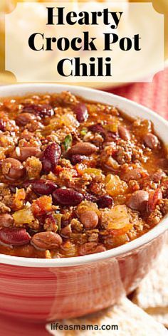 hearty crock pot chili in a bowl with tortilla chips on the side