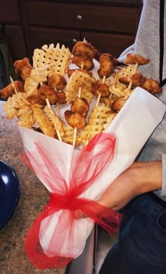 a basket filled with cheetos on top of a counter