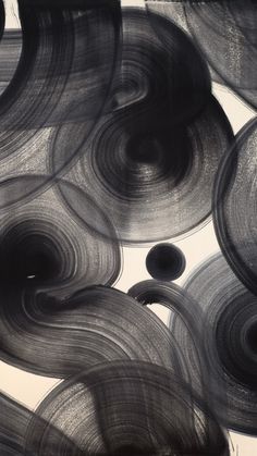 black and white abstract painting with circles