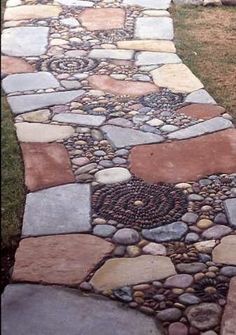 a walkway made out of rocks and stones