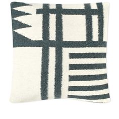 a black and white pillow on a white background