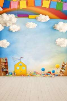 an empty room with a rainbow painted on the wall and bookshelves in the background