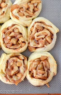 several cinnamon rolls sitting on top of a table