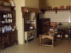 an old fashioned kitchen with wooden cabinets and tile on the floor is pictured in this image