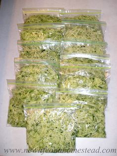 there are many bags of shredded vegetables on the table