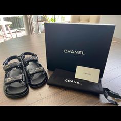 Chanel Grained Calfskin Velcro Sandals With Gold Cc Logo Emblems Black Size 38 Eu Comes With Box And Dust Bags Purchased From Neiman Marcus Online. E-Receipt Attached. Used Several Times But In Great Condition. Sole Shows Normal Wear Outside The Sole Protector. The Sole Protector Can Be Removed/Replaced. Velcro Sandals, Cc Logo, Emblem Logo, Women's Shoes Sandals, Neiman Marcus, Calf Skin, Shoes Sandals, Dust Bag, Chanel