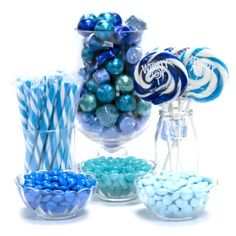 blue and white candies in glass vases with candy