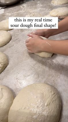 a person kneading dough on top of a table with the words, this is my real time sour dough final shape