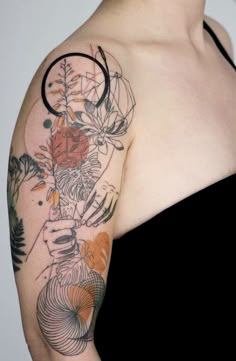 a woman with a tattoo on her arm